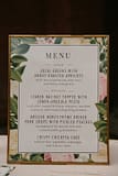 Menu in gold frame inspired by Nectar and Root, Vermont wedding florist at Shelburne Coach Barn in Shelburne, Vermont.