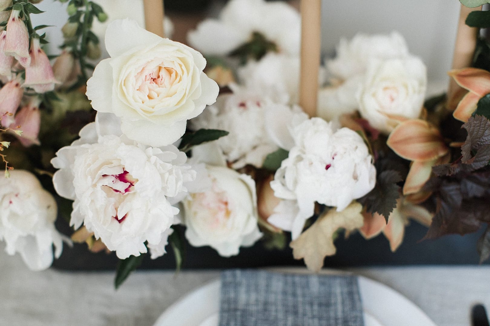Spring peony centerpiece by Nectar and Root, Vermont wedding florist at Foxfire Mountain House in the Catskills, New York.