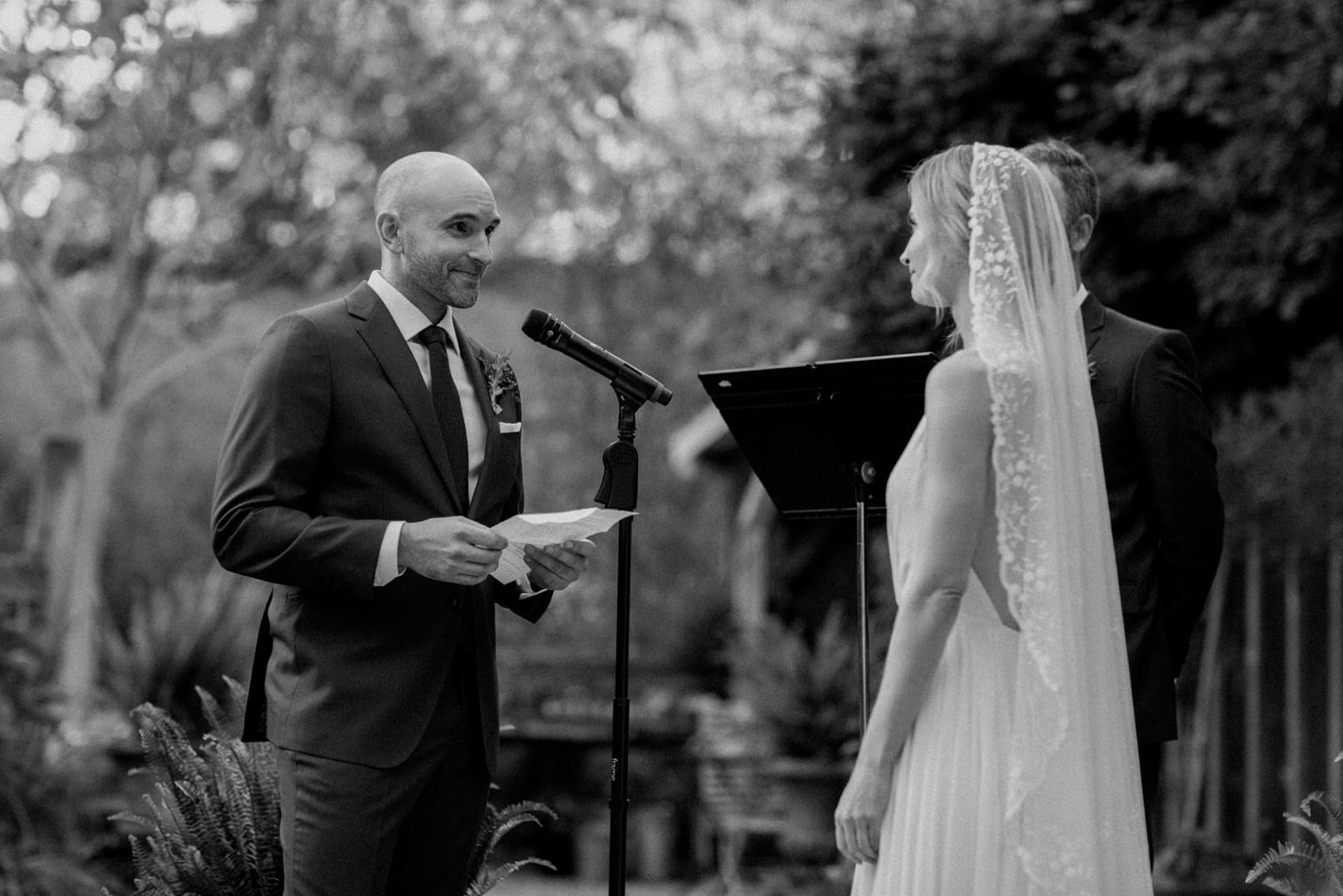 Groom reading vows at M & D Farm