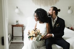 Bride and groom holding neutral bridal bouquet by Nectar and Root, Vermont wedding florist at Foxfire Mountain House in the Catskills, New York.