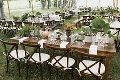 Neutral spring farm table centerpieces by Nectar and Root, Vermont wedding florist at Shelburne Museum in Shelburne, Vermont.